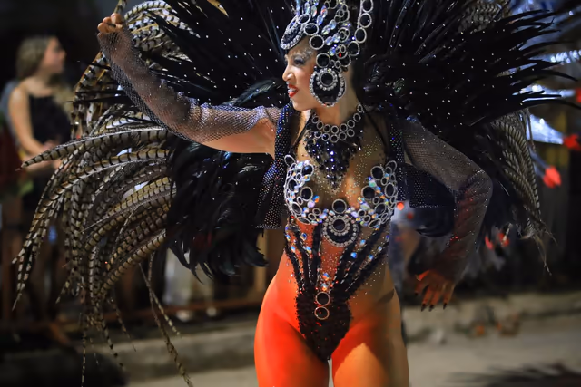 Barrio Rampla featured dancer with black feathers