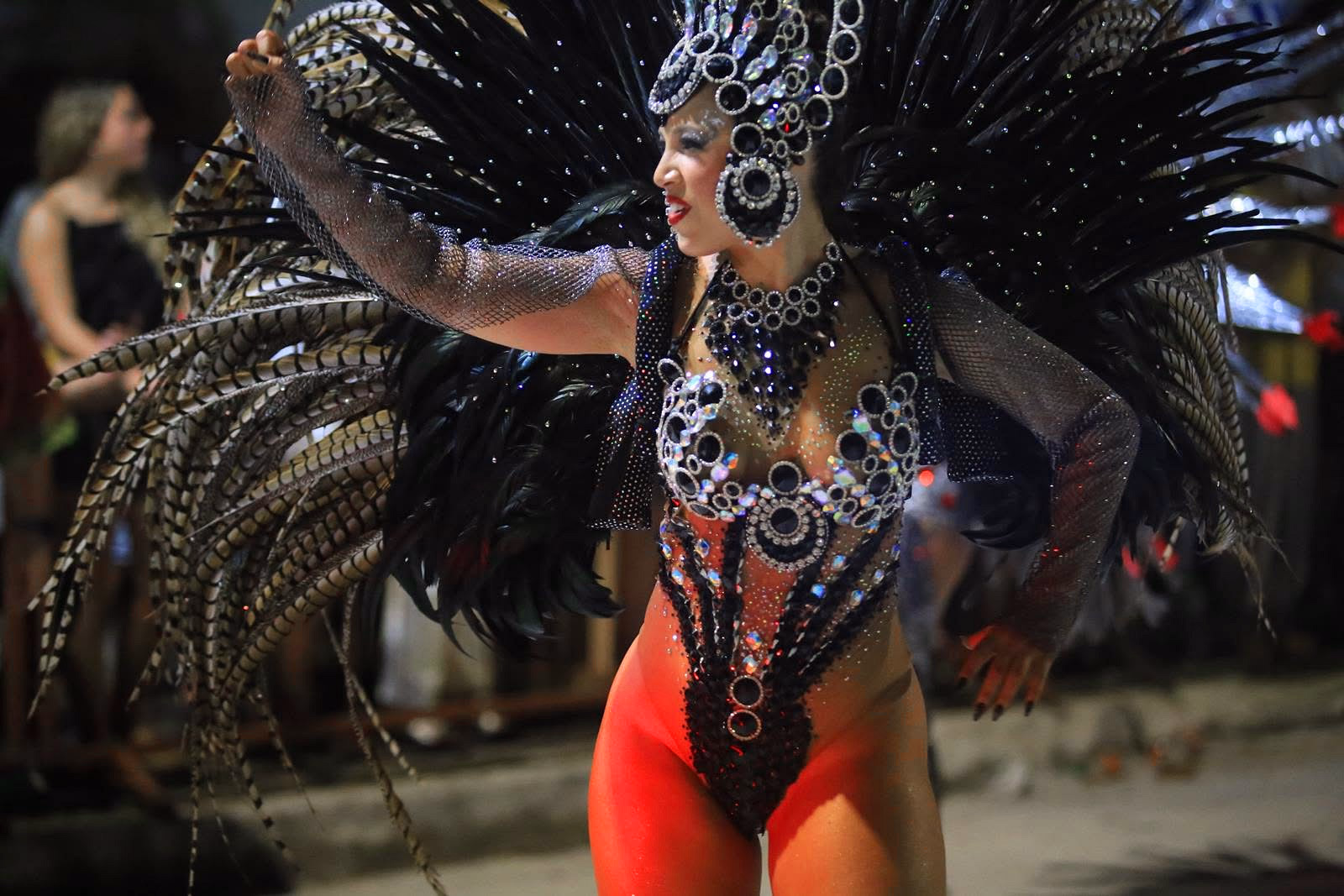 Barrio Rampla featured dancer with black feathers