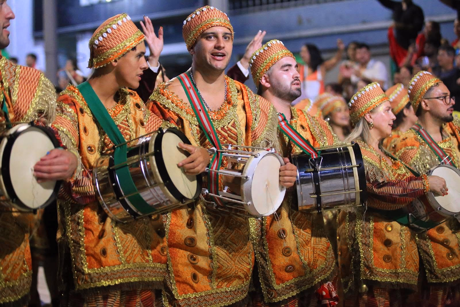 Barrio Rampla drum section with drums and gold costumes